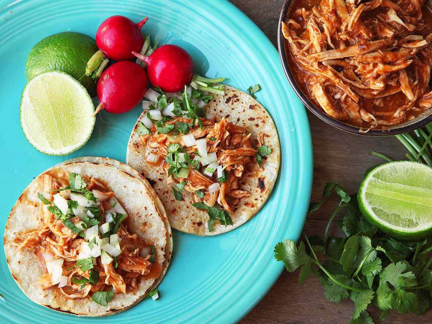 Chicken tinga on a blue plate